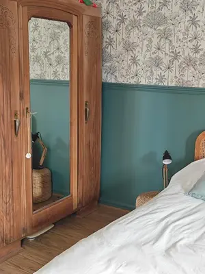 Un ou plusieurs lits dans un hébergement de l'établissement Grande chambre cosy très proche centre ville