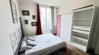 Un ou plusieurs lits dans un hébergement de l'établissement Cozy apartment, close to Gare du Mans