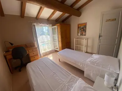 Un ou plusieurs lits dans un hébergement de l'établissement Jolie maison provençale