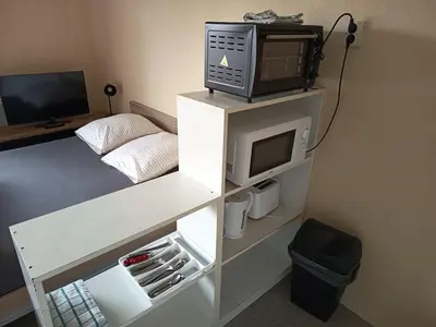 Télévision ou salle de divertissement dans l'établissement Grand Studio 4 couchages proche Université et CHU