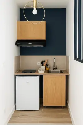 Cuisine ou kitchenette dans l'établissement Grand Studio entier proche de Tours