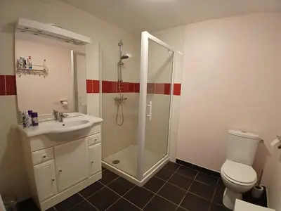 Salle de bains dans l'établissement Gite L'Atout de France