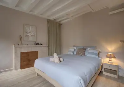 Un ou plusieurs lits dans un hébergement de l'établissement Cozy T2 - Quartier de Nantilly - Saumur