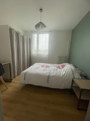 Un ou plusieurs lits dans un hébergement de l'établissement Spacieux T4 lumineux avec balcon confort, calme et modernité à Joué-lès-Tours