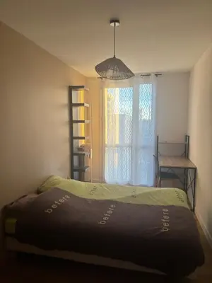 Un ou plusieurs lits dans un hébergement de l'établissement Spacieux T4 lumineux avec balcon confort, calme et modernité à Joué-lès-Tours
