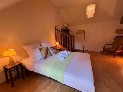 Un ou plusieurs lits dans un hébergement de l'établissement Maison de campagne de charme