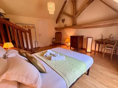 Un ou plusieurs lits dans un hébergement de l'établissement Maison de campagne de charme