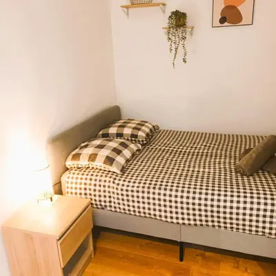 Un ou plusieurs lits dans un hébergement de l'établissement Le Cosy Colbert - T2 - Cathédrale - Wifi - TV