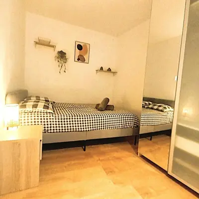 Un ou plusieurs lits dans un hébergement de l'établissement Le Cosy Colbert - T2 - Cathédrale - Wifi - TV