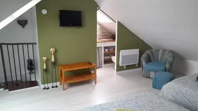 Coin salon dans l'établissement Home Sweet Home
