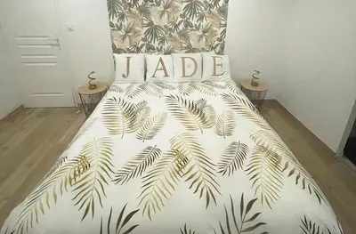 Un ou plusieurs lits dans un hébergement de l'établissement Le chalet de Jade en Sologne - Châteaux et Zoo de Beauval