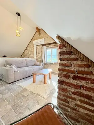 Coin salon dans l'établissement L'Ecrin Saint Denis, petite au centre d'Amboise!
