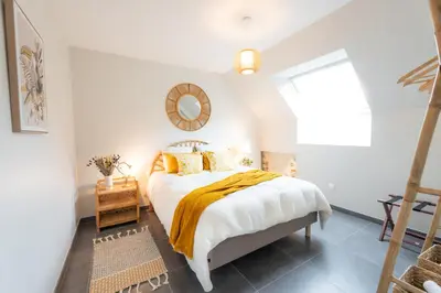 Un ou plusieurs lits dans un hébergement de l'établissement Le Refuge 50m2 - Logement avec jardin près de Blois