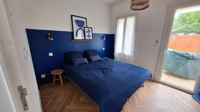 Un ou plusieurs lits dans un hébergement de l'établissement La Maison Des Pins