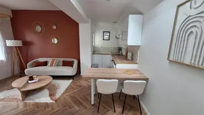 Coin salon dans l'établissement La Maison Des Pins