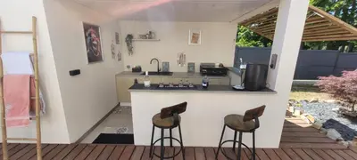 Cuisine ou kitchenette dans l'établissement Chambres proche circuit 24h du Mans