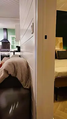 Un ou plusieurs lits dans un hébergement de l'établissement Le 10 du NC - Appartement cosy