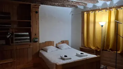 Un ou plusieurs lits dans un hébergement de l'établissement Auberge du pré