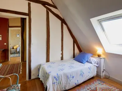 Un ou plusieurs lits dans un hébergement de l'établissement Gîte de charme avec jardin privatif en Touraine - FR-1-381-642