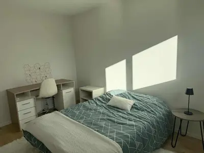 Un ou plusieurs lits dans un hébergement de l'établissement Cozy M&O House