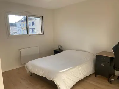 Un ou plusieurs lits dans un hébergement de l'établissement Cozy M&O House