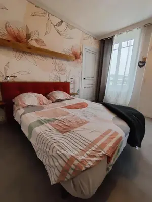 Un ou plusieurs lits dans un hébergement de l'établissement chambre agréable