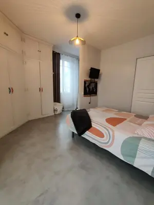 Un ou plusieurs lits dans un hébergement de l'établissement chambre agréable