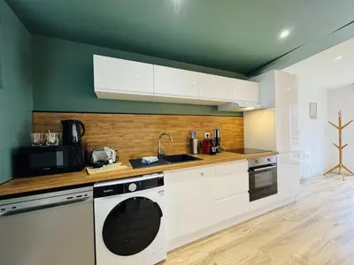 Cuisine ou kitchenette dans l'établissement Le Coteau de Gazonfier - quartier Bollée - 7p