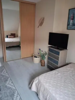 Un ou plusieurs lits dans un hébergement de l'établissement Appartement lumineux avec jardin à Le Mans, 35 m², 2 pers.