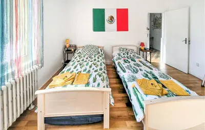 Un ou plusieurs lits dans un hébergement de l'établissement La Maison Fantonette