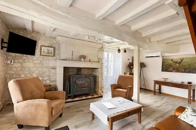 Télévision ou salle de divertissement dans l'établissement Gîte Du Parc
