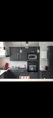 Cuisine ou kitchenette dans l'établissement Maison des 24h