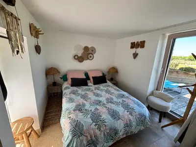 Un ou plusieurs lits dans un hébergement de l'établissement Tiny house gite la Poitevinière, terrasse, barbecue, proche Saumur et Loire