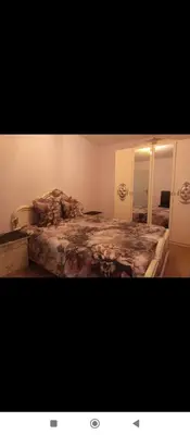 Un ou plusieurs lits dans un hébergement de l'établissement Agreable appartement