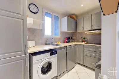 Cuisine ou kitchenette dans l'établissement Appartement Cosy - Hyper centre - Proche Commerces