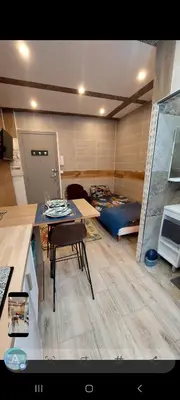 Cuisine ou kitchenette dans l'établissement Studio tt équipé