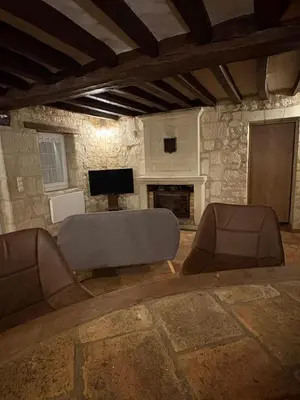 Télévision ou salle de divertissement dans l'établissement Maison de campagne 6 personnes La bergerie des vignes
