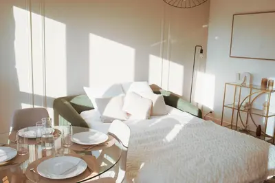 Un ou plusieurs lits dans un hébergement de l'établissement Appartement cosy avec vue dégagée, Centre du Mans