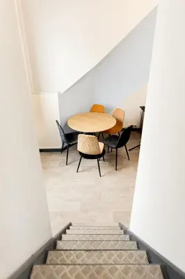 Coin salon dans l'établissement La Pause Velpeau - Proche Gare