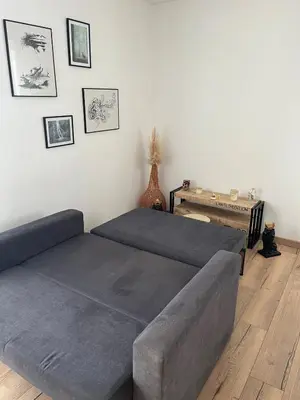 Coin salon dans l'établissement Bright apartment