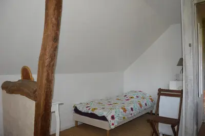 Un ou plusieurs lits dans un hébergement de l'établissement Gite la Poitevinière, jardin, barbecue, proche Saumur, 7 couchages