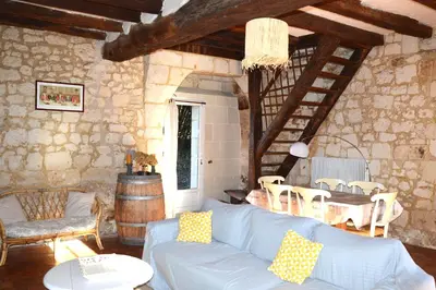 Coin salon dans l'établissement Gite la Poitevinière, jardin, barbecue, proche Saumur, 7 couchages