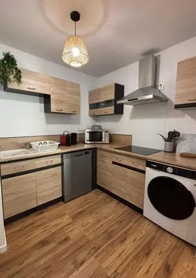 Cuisine ou kitchenette dans l'établissement La Douce Parenthèse
