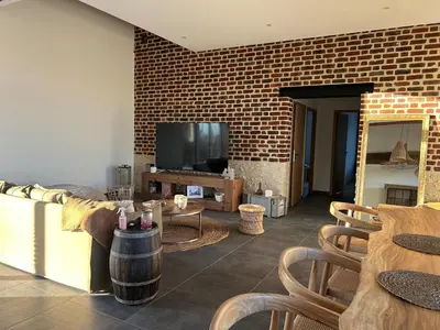 Télévision ou salle de divertissement dans l'établissement Grange rénovée