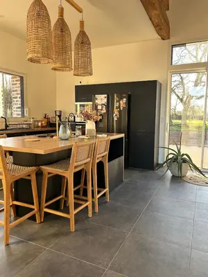 Cuisine ou kitchenette dans l'établissement Grange rénovée
