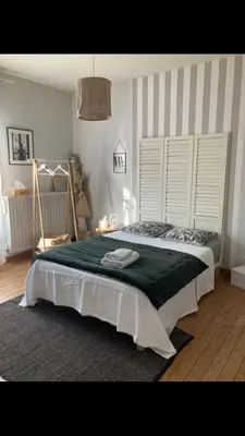 Un ou plusieurs lits dans un hébergement de l'établissement 3-bedroom house with garden, near city center