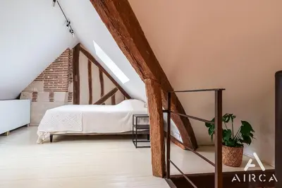Un ou plusieurs lits dans un hébergement de l'établissement Duplex 55 Grand Duplex en plein centre de Tours
