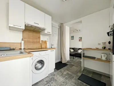 Cuisine ou kitchenette dans l'établissement Le Grammont 2 pièces