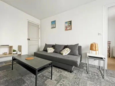 Coin salon dans l'établissement Le Grammont 2 pièces