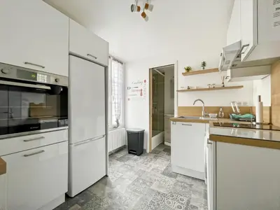 Cuisine ou kitchenette dans l'établissement Le Grammont 2 pièces